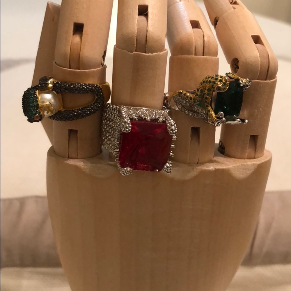 Three size six unusual costume dinner rings.